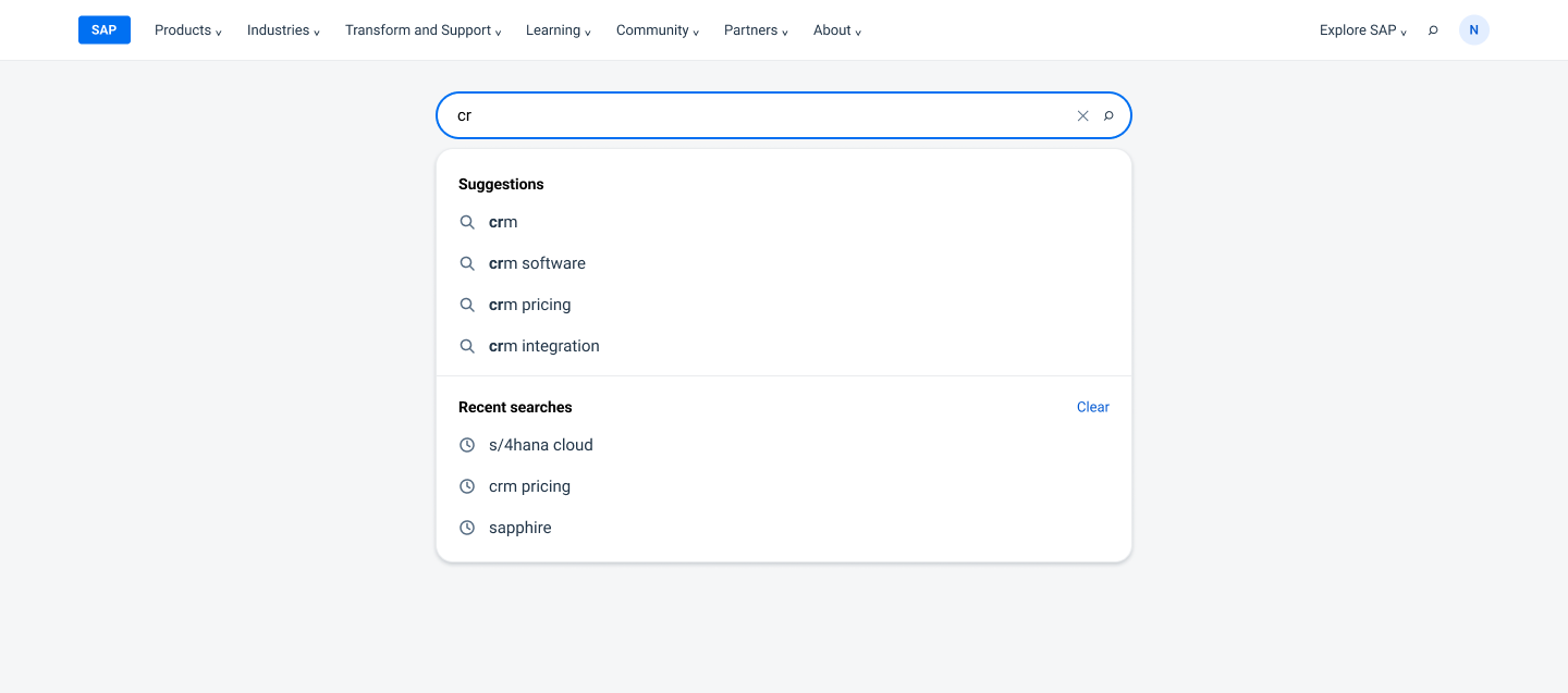 Recreated search field in focus with a panel below it showing four suggestions and three recent searches